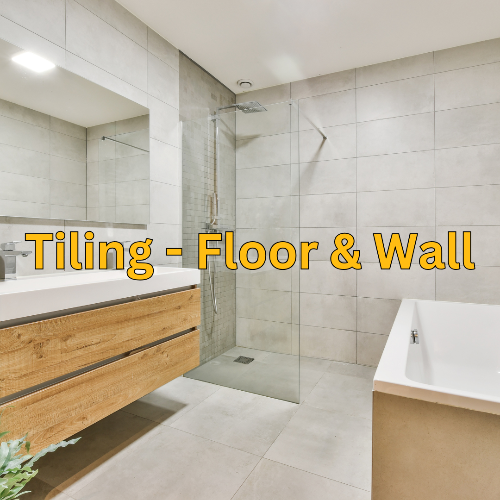 Modern bathroom with tiled floor and walls, featuring a wooden vanity and glass shower enclosure.